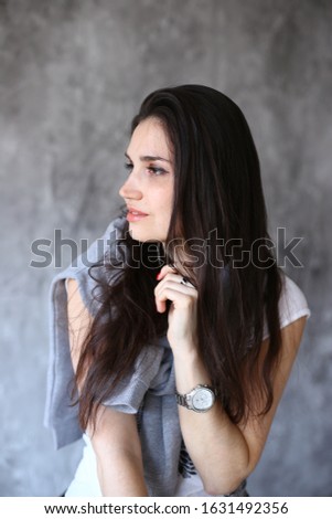 romantic and pensive girl in a positive mood