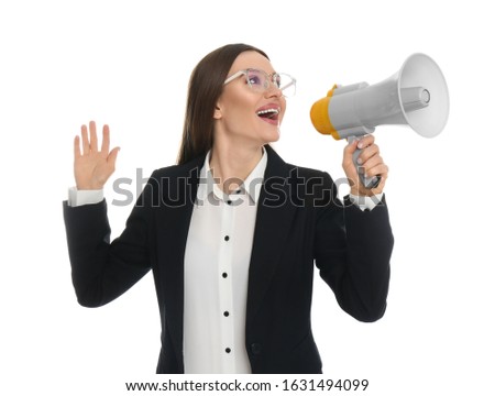 Young woman with megaphone on white background