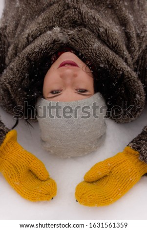portrait of young woman in winter