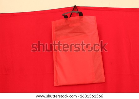 Beautiful Non Woven Polypropylene Fabric Shopping Bags with red background