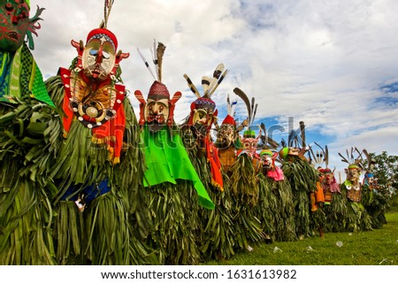 Traditional Mask Dance from Dayak Tribe of Borneo. The name of the dance is Hudoq. They dance to celebrate the harvest season.