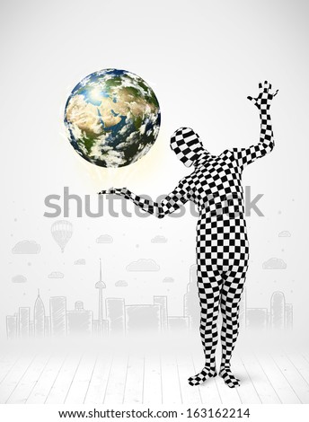 Funny man in full body suit holding planet earth