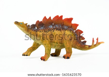 Dinosaur rubber toy isolated on white
