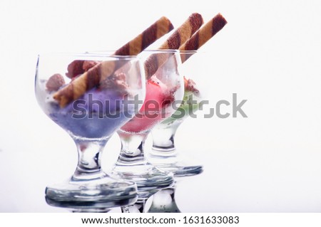 Colourful Ice cream on Glass isolate on White 