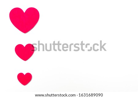Love hearts shape on white background with copy space on the right. Celebration for World Wedding Day, Valentine's Day, Mother's Day, etc. Horizontal shot.