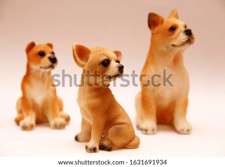 toys in the form of dogs on a white background