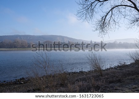 View from the bank of the Rhine in the morning mist