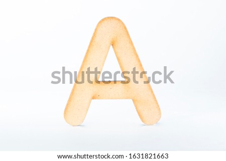 
wooden alphabet letters on white background