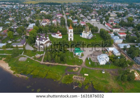 Old Cathedral Square in the cityscape on august morning (aerial photography). Kargopol, Russia