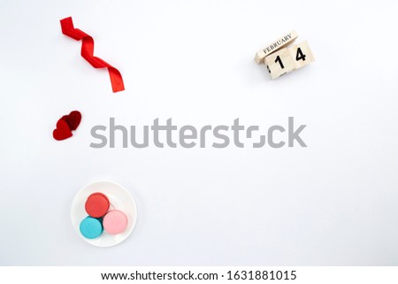 Flat lay Valentines Day background , day love, February 14 concept wooden perpetual calendar on white background, Copy space, composition for text
