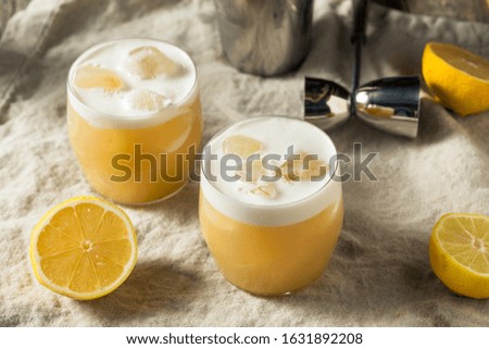 Alcoholic Tequila Lemon Sour Cocktail with Egg White