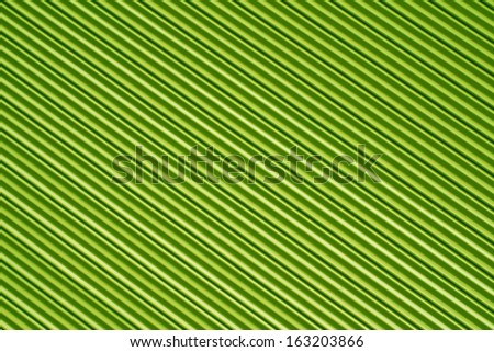 Green roller door or blind with parallel striped lines