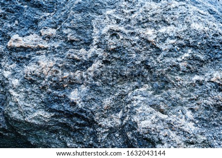 stone in the form of sea waves. Abstract fossil of marble slab. nature texture for design. Close up