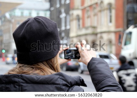 Taking a picture in the street