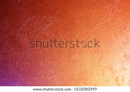 Classic orange for background design. Colored background. Art plaster. Illuminated surface. Abstract image. Bitmap image.