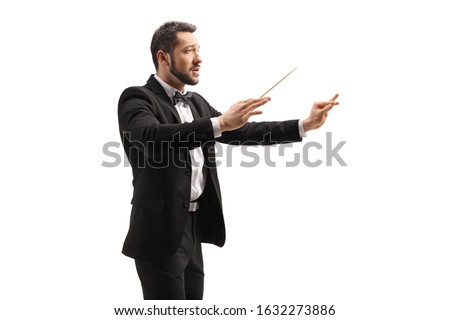 Male conductor in a suit conducting with a baton and gesturing with hand isolated on white background Royalty-Free Stock Photo #1632273886