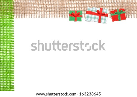 Gift wrapped packages with jute frame background as part of a series of Christmas Themed, Paper torn ornaments. 
