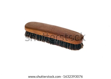 Wooden cleaning scrub brush on white background