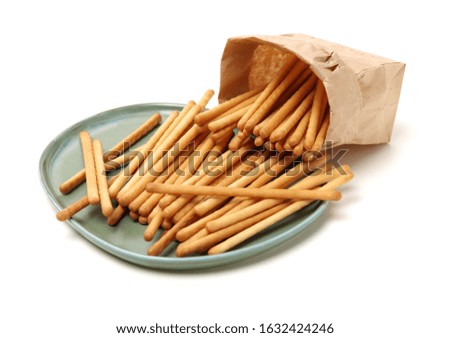 bread sticks on white background 