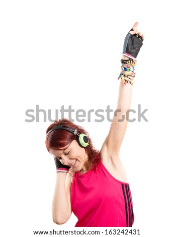 Young sport girl dancing over white background