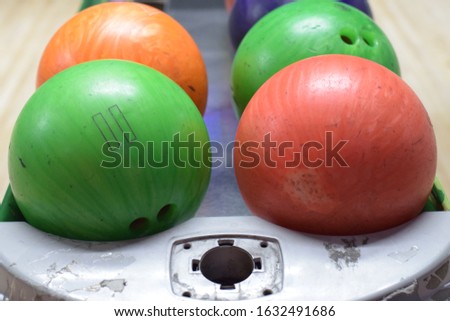 an assortment of bowling balls
