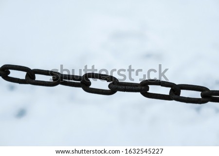 Old steel chain on a white background