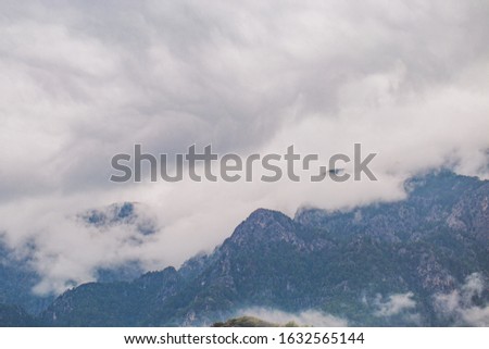 Horizontal photography of hills of mountains and grey clouds. Turkey landscape.