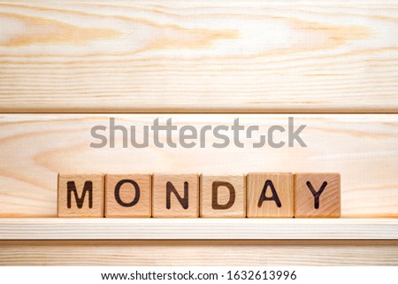 Day of the week. Monday made from vintage wooden cubes. Small business concept. First working day. Calendar background. Week day concept. Working day. Business concepts. Name of the week