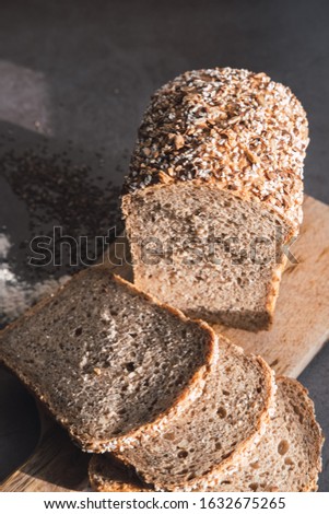 Homemade millet and buckwheat bread slices. Vertical picture.