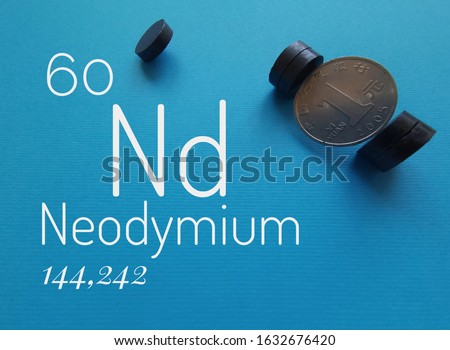 Neodymium is a chemical element with the symbol Nd and atomic number 60. A rare-earth metal of the lanthanide series of the periodic table. Chemical symbol Nd with super strong neodymium magnets. 