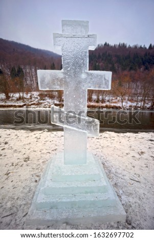 The Feast of the Baptism of Christ the Son of God in the Jordan River is celebrated for 2,000 years in Europe and America. Traditional swimming and carved ice cross.