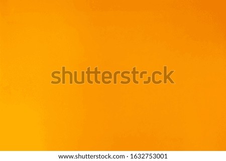 Orange blurred background. Orange abstract gold background yellow color, light corner spotlight, faint orange vintage background. Colorful
