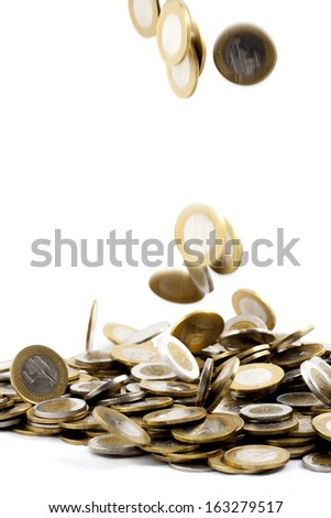 falling coins on isolated background