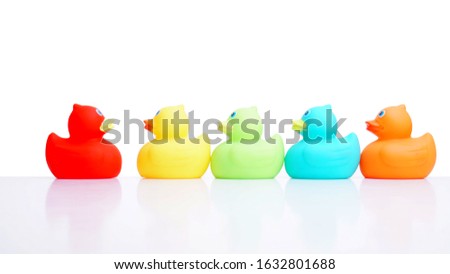 variety of rubber bath ducks isolated on the white background