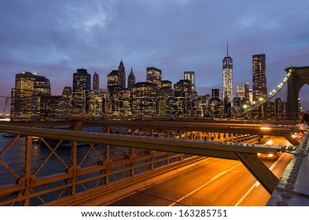 The Brooklyn bridge at dusk with downtown Manhattan, New York City. USA.