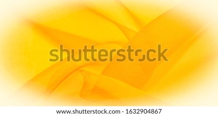 Texture of yellow silk fabric. It is also perfect for your design, clothes, posters. Be creative with beautiful project accents. This fabric is inspired by your inspiration.