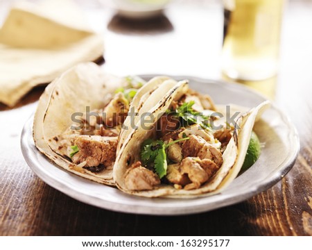 authentic mexican tacos with chicken and cilantro