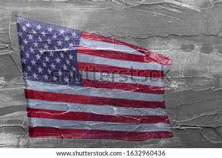 American flag painted on a rustic background