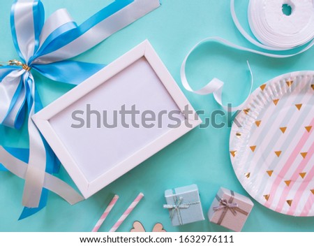 flat lay of valentine concept, ribbon and Picture frame on pastel background with blank space for text.