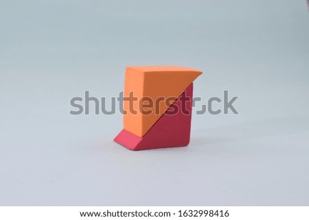 Color orange and red geometry shape with blue white isolated background.