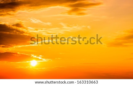 Sunset, sunrise with clouds. Yellow warm sky background
