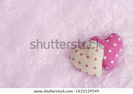Valentine's day celebration concept. Heart on textured paper background. Festive background for Valentine's Day. Place for text.
