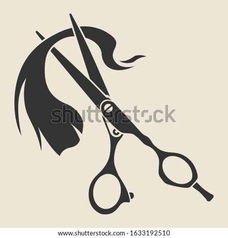Silhouette of vector hairdressing dark gray scissors with a curl of hair on a beige background