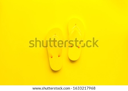 Flip Flops Yellow On Yellow Background top view mockup