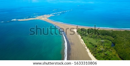 Aerial Drone View of the Whale's Tail at the Marino Ballena National Park in Uvita, Costa Rica Royalty-Free Stock Photo #1633310806