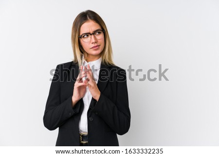 Young business caucasian woman making up plan in mind, setting up an idea.