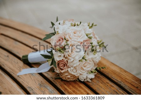 Wedding flowers on a bench