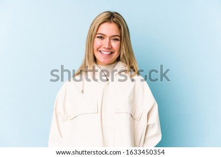 Young blonde caucasian woman isolated happy, smiling and cheerful.