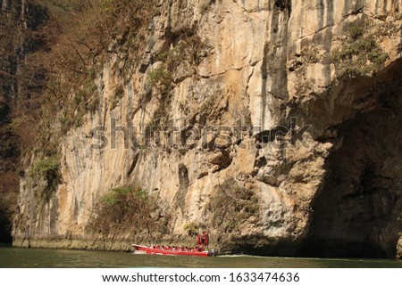 Photograph of a river between rocks 