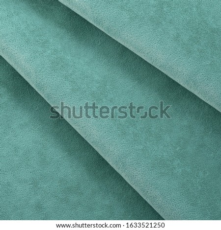suede leather, texture, smooth emerald velvet upholstery, wave, ornament, faux suede. High resolution photo.